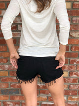 Black Distressed Cut Off Shorts have comfort stretch fit by Hammer   Take your outfit to the next level with OC Social Butterfly's hand selected, specially curated stylish shorts. You can't go wrong a great pair of distressed denim shorts.  Ships from the USA, unique style, fashion trends, black shorts, stagecoach festival attire 